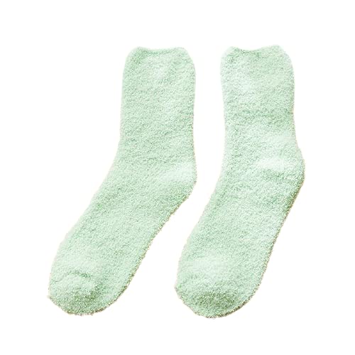 A delightful pair of black cat socks decorated with pink hearts, offering a unique and playful accessory for any occasion.