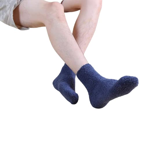 A delightful pair of blue fuzzy socks alongside a wooden box, ideal for adding comfort and charm to your home.