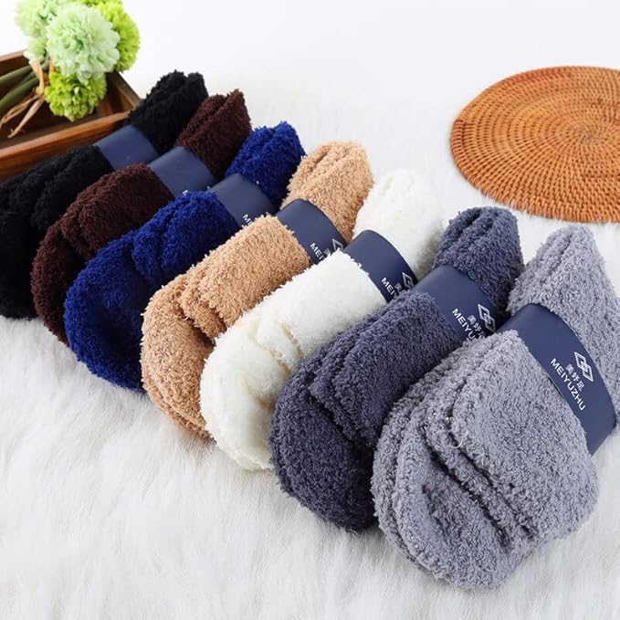 A set of blue fuzzy socks and a wooden box, offering a warm and inviting touch to your cozy space.