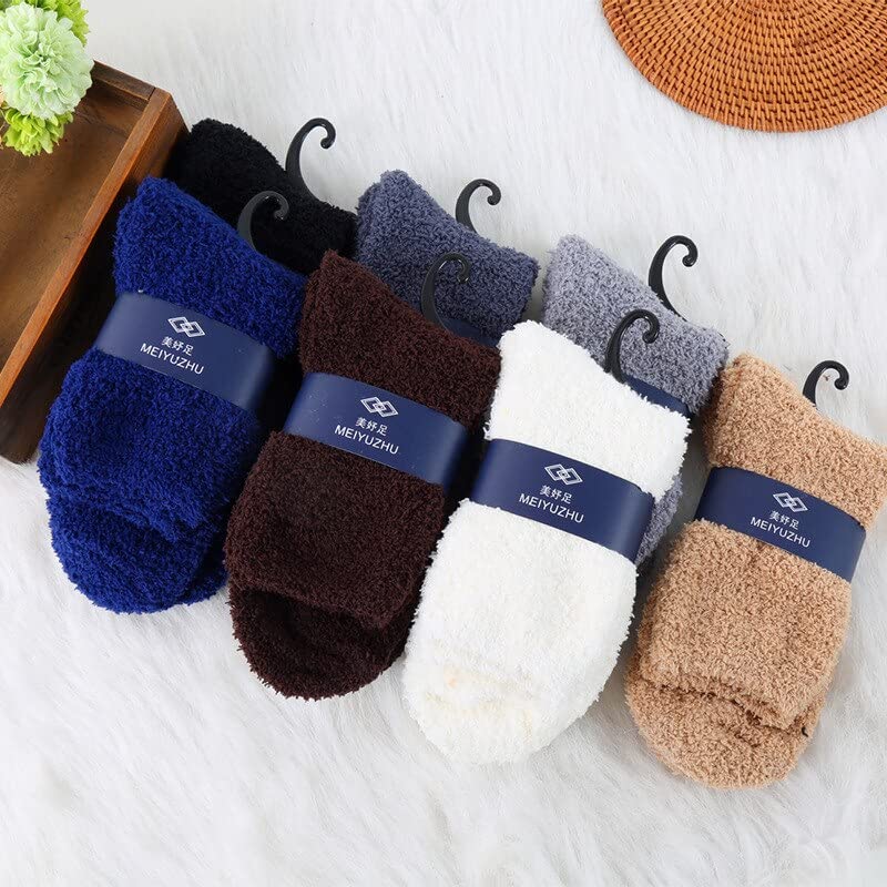 A close-up of white socks with distinct blue and white labels, showcasing their design.