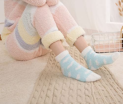 A cozy pair of blue socks adorned with cute red hearts, perfect for adding a fun touch to your outfit.