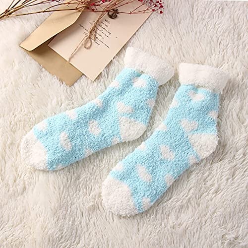 A pair of blue socks adorned with red hearts, showcasing a playful and vibrant design.