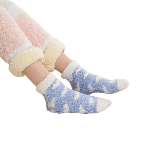 Blue and white socks featuring charming heart designs, ideal for a fun and cozy addition to your wardrobe.