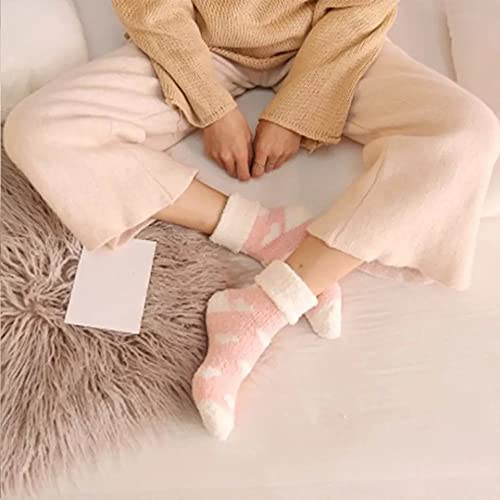 A cozy sock adorned with a pink and white heart pattern, perfect for adding a touch of whimsy to any outfit.