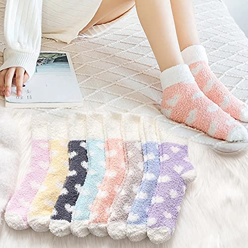 A stylish sock with a delightful pink and white heart design, perfect for keeping your feet warm and fashionable.