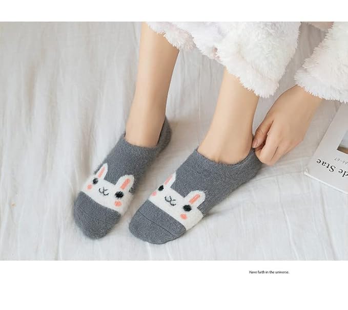 A pair of socks featuring a cute bunny face design, perfect for adding a playful touch to your outfit.