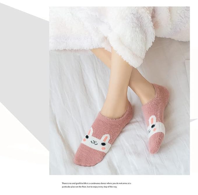 A cute pink felt bunny with fluffy white ears, perfect for springtime decorations or children's toys.