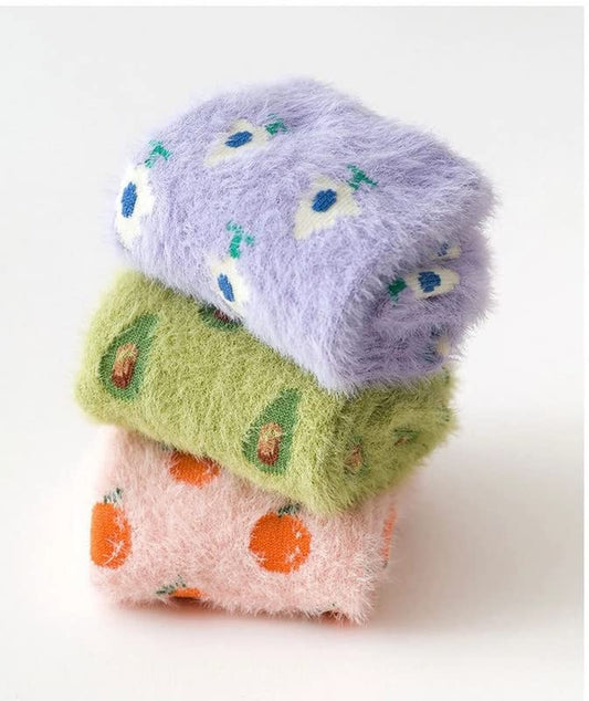 Fun green avocado socks that bring a playful vibe to your wardrobe, ideal for casual wear or lounging at home.
