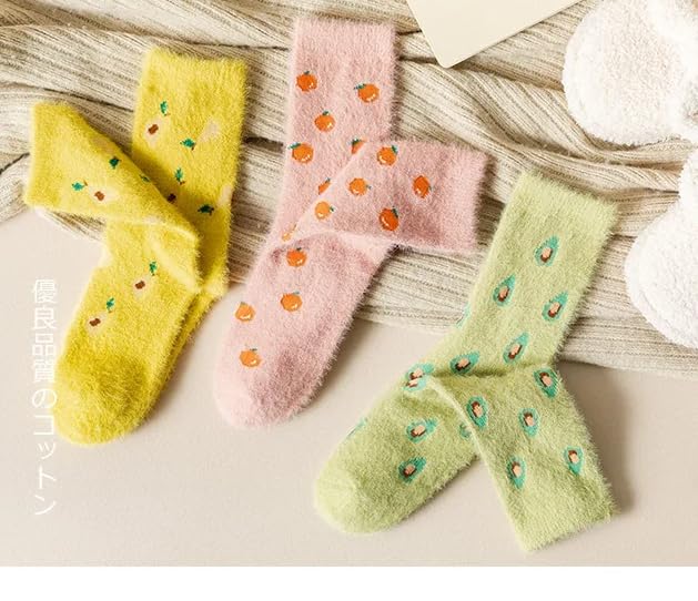 A pair of sunny yellow socks showcasing delightful fruit motifs, adding a playful touch to your sock collection.