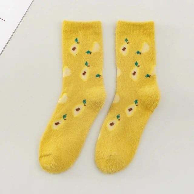 A cheerful pair of yellow socks adorned with colorful fruit patterns, perfect for adding fun to any outfit.