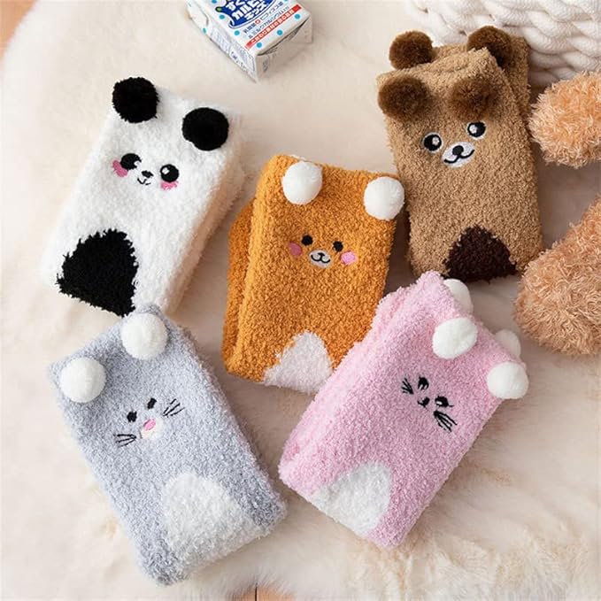 Two pairs of socks featuring playful brown and white bears, a delightful addition to your cozy collection.
