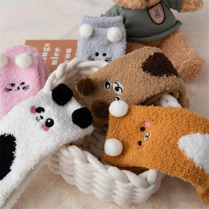 Two pairs of socks featuring whimsical brown and white bear motifs, perfect for a fun and cozy look.