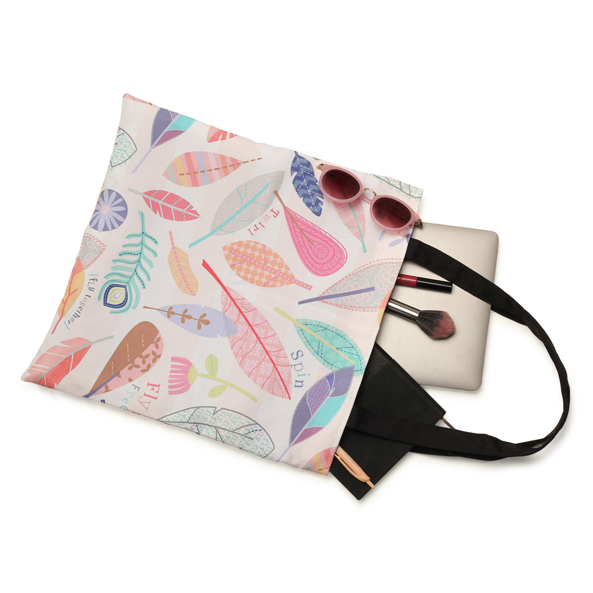 A multicolored tote bag adorned with a leaf design, showcasing a blend of hues for a fashionable and functional accessory.