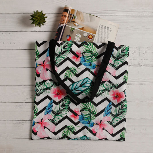 Vibrant tote bag featuring a tropical design, ideal for carrying essentials.