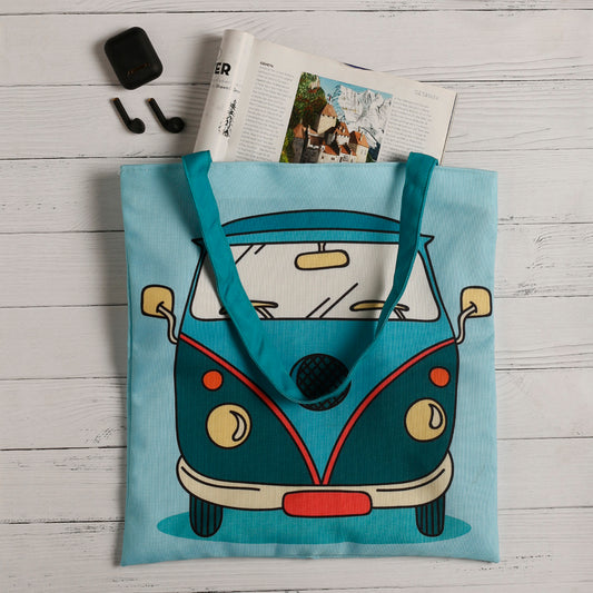 A vibrant tote bag showcasing a blue and green VW bus, ideal for carrying essentials with a touch of retro charm.