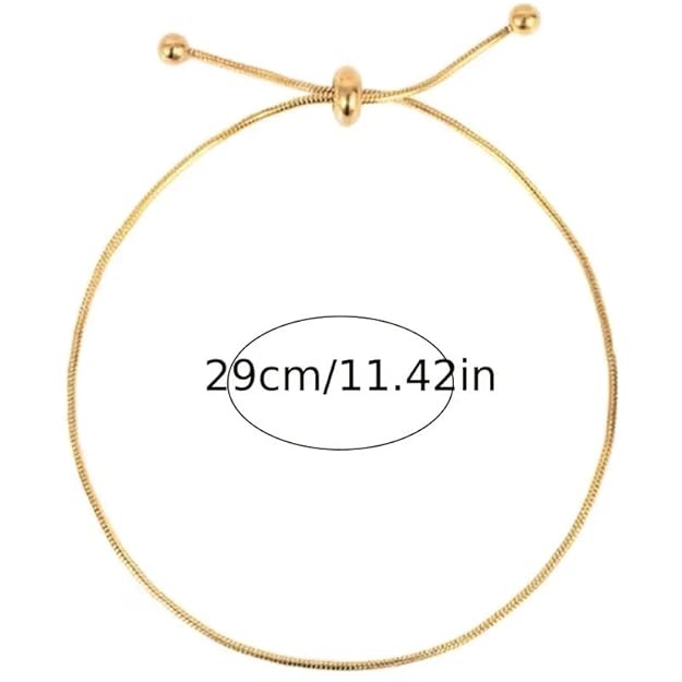 Gold bracelet with delicate chain, perfect for adding a touch of elegance to any outfit.