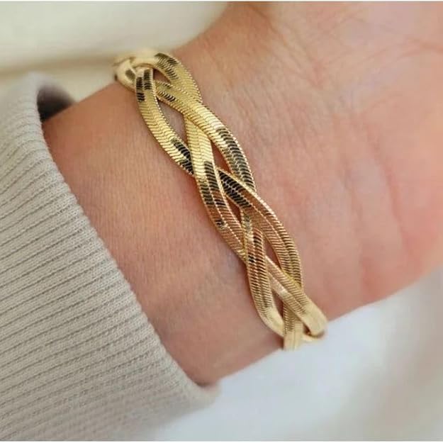 Shiny gold bracelet with chain link design, perfect for adding a touch of elegance to any outfit.