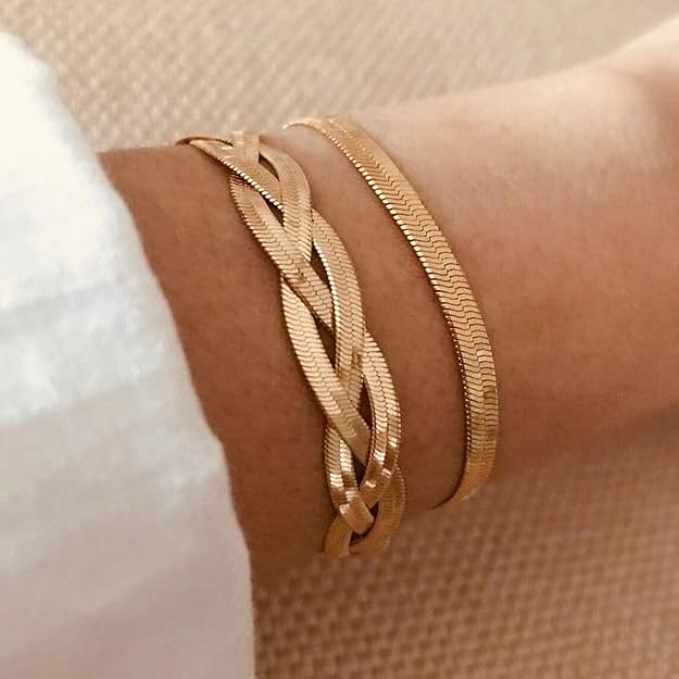 Sleek gold bracelet adorned with beautiful chain link accents.