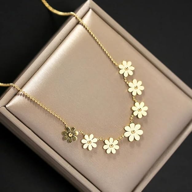 Gold necklace with four flower pendants, elegant and delicate jewelry piece