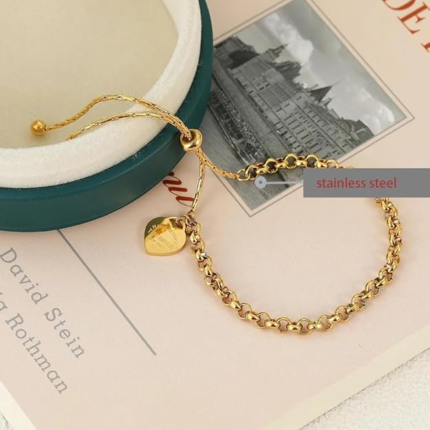 Dazzling gold plated bracelet with heart charm, a beautiful expression of love and style.