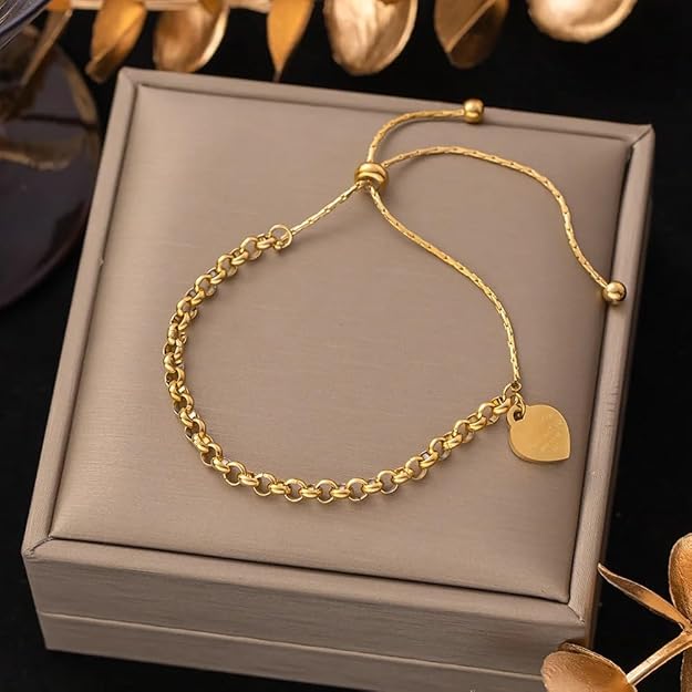 Elegant gold plated bracelet featuring a heart charm, ideal for adding a romantic touch.