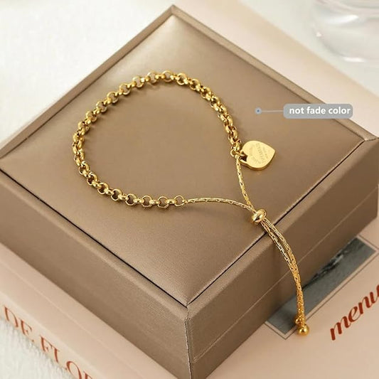 Gold plated bracelet with heart charm, perfect accessory for a touch of elegance and love.