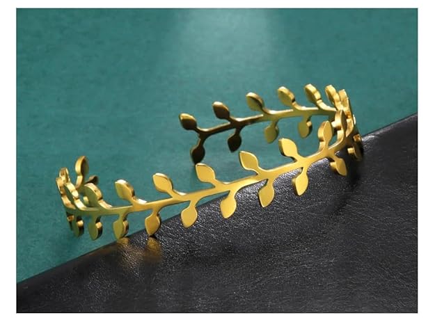 Elegant gold leaf cuff bracelet, a stunning accessory to elevate your style.