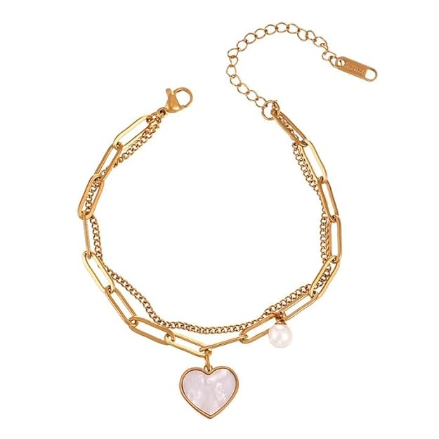 Chic gold bracelet adorned with heart charm and pearl accent.