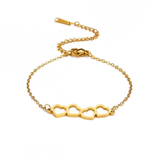 A gold bracelet adorned with two heart symbols.