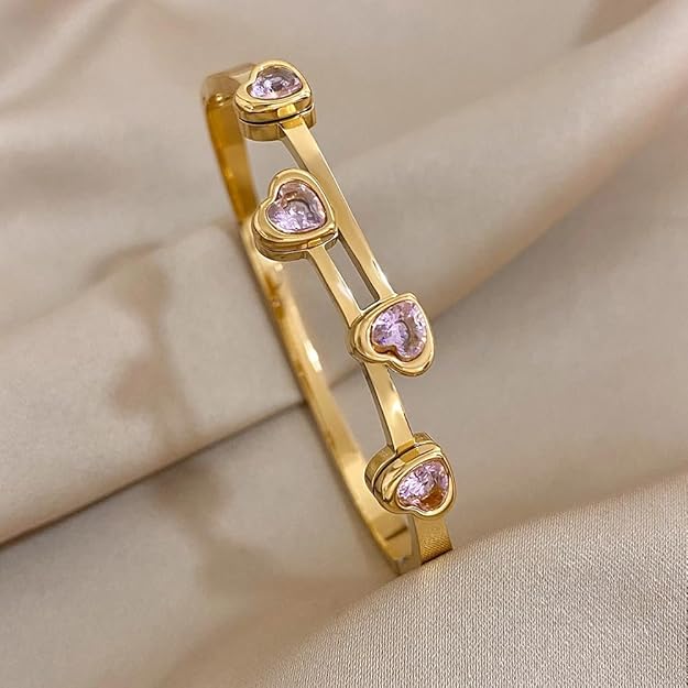 Gold plated bracelet with pink sapphire stones