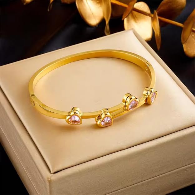 Elegant gold bracelet adorned with pink sapphires