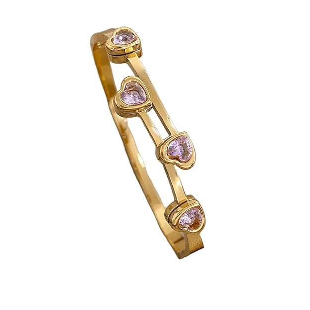 Luxurious gold plated bracelet adorned with stunning pink sapphire stones.