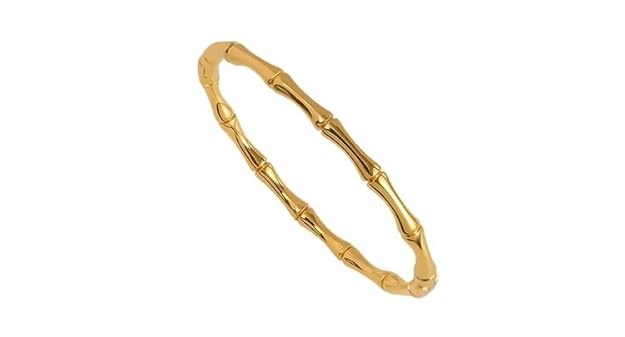 Gold bracelet embellished with charming bamboo leaf design.