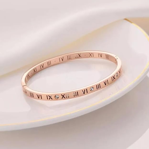 Rose gold bracelet with Roman numerals, elegant and timeless accessory.