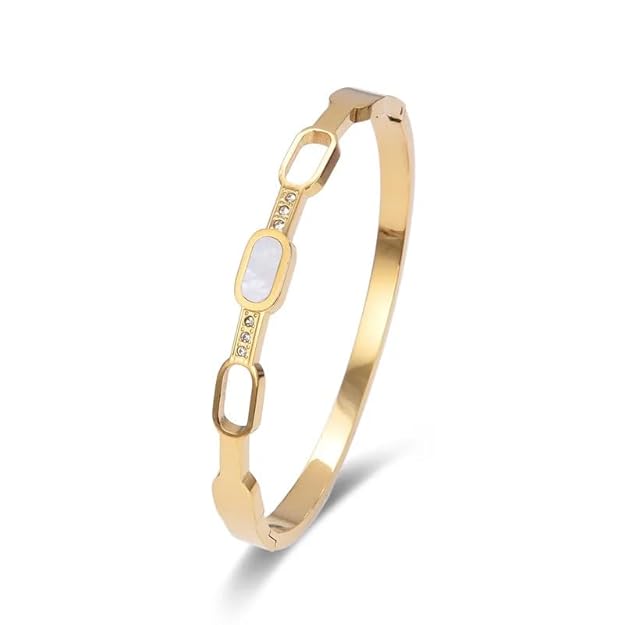 Elegant gold bracelet with white stones, a sophisticated addition to any outfit.