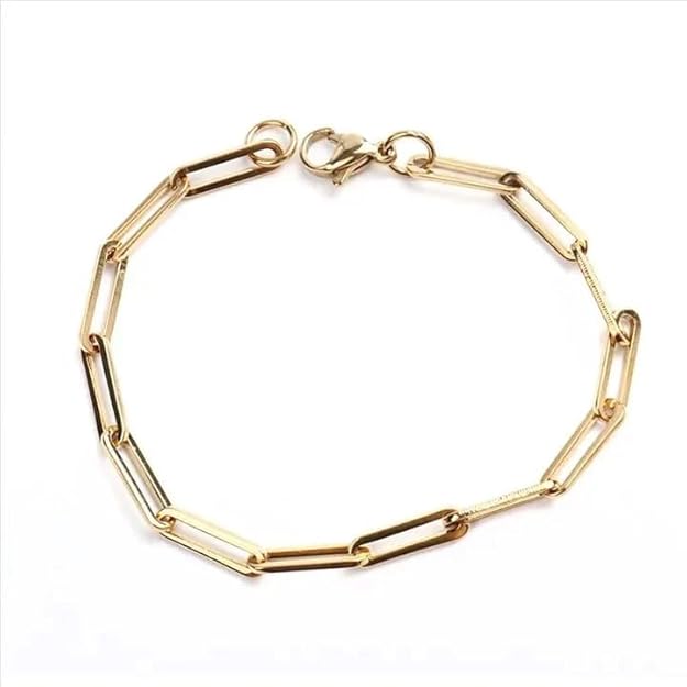 Gold link chain bracelet on white background.