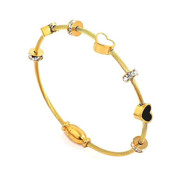 Stylish gold bracelet with a design of black and white hearts, combining elegance and playfulness in one accessory.