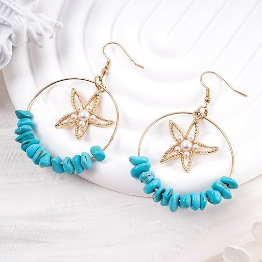 Beautiful gold starfish earrings, a must-have for any fashionista.