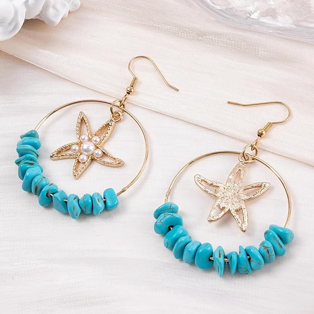 Shiny gold starfish earrings, perfect for a beach day or a night out on the town.