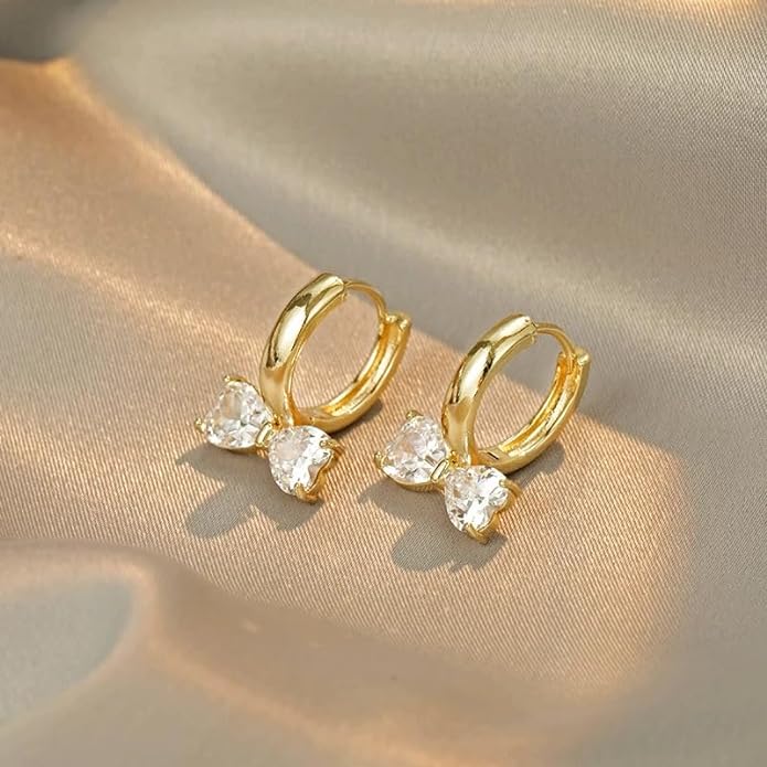 Elegant gold plated earrings with sparkling white crystals.