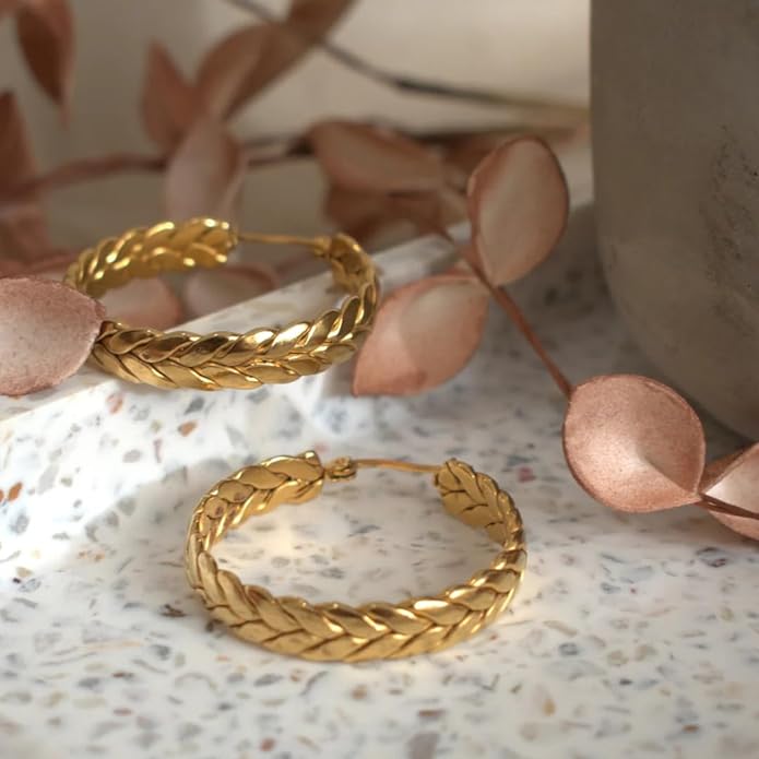 Stylish gold plated hoop earrings, perfect for adding a touch of elegance to any outfit.