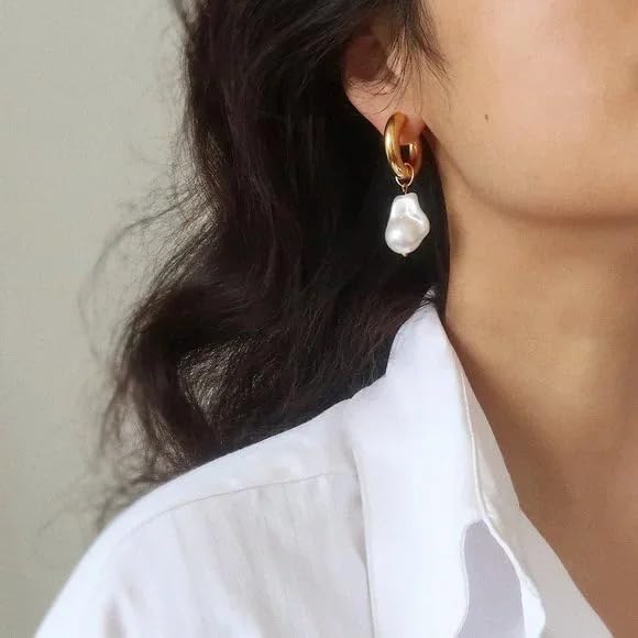 Pair of gold hoop earrings adorned with white pearls, perfect for adding a touch of glamour.