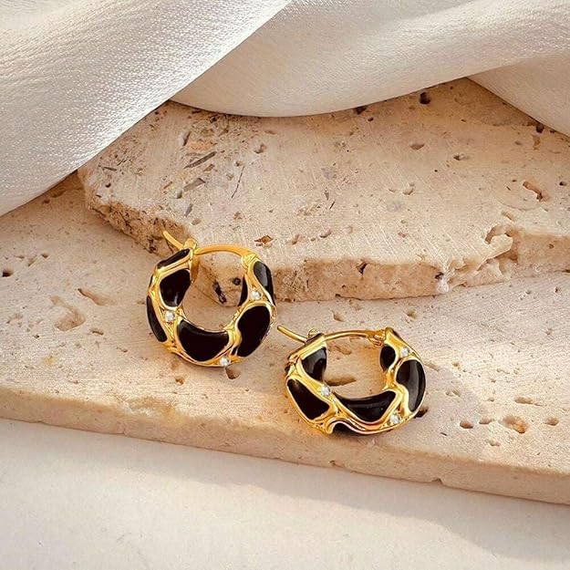 Elegant gold plated hoop earrings with black enamel.