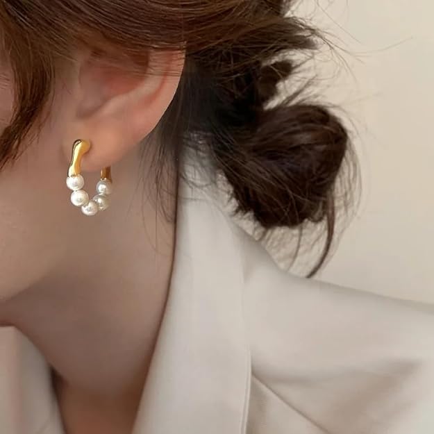 Chic pearl hoop earrings, a must-have accessory for any fashion-forward individual.