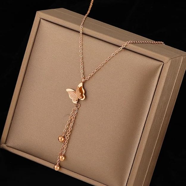 Gold necklace with butterfly charm, elegant and delicate jewelry piece