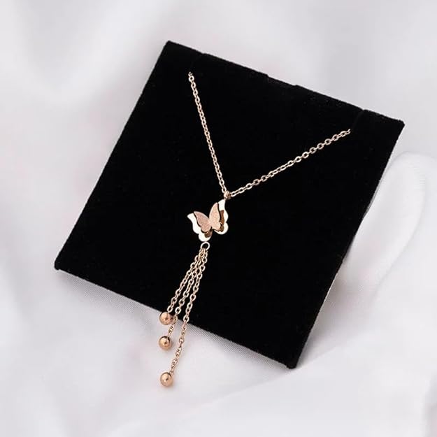 Butterfly charm on gold plated necklace, perfect accessory for any outfit.