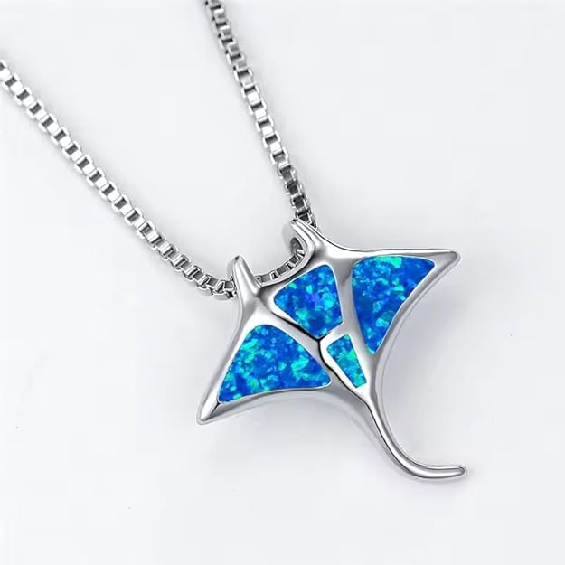 Blue sting ray pendant on chain, perfect accessory for ocean lovers.