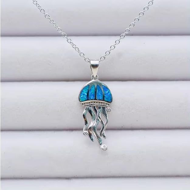  Blue shell jellyfish pendant, a unique accessory for sea enthusiasts.