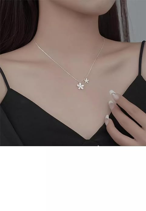 Dainty rose gold necklace featuring a charming flower and butterfly motif.