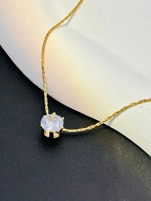 Gold plated necklace with white diamond, elegant and luxurious jewelry piece.